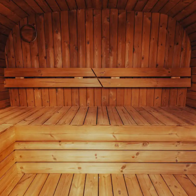 Mande Spa USA MW16 sauna interior with benches and warm lighting, creating a relaxing home spa atmosphere.