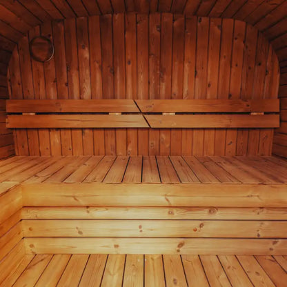 Mande Spa USA MW16 sauna interior with benches and warm lighting, creating a relaxing home spa atmosphere.