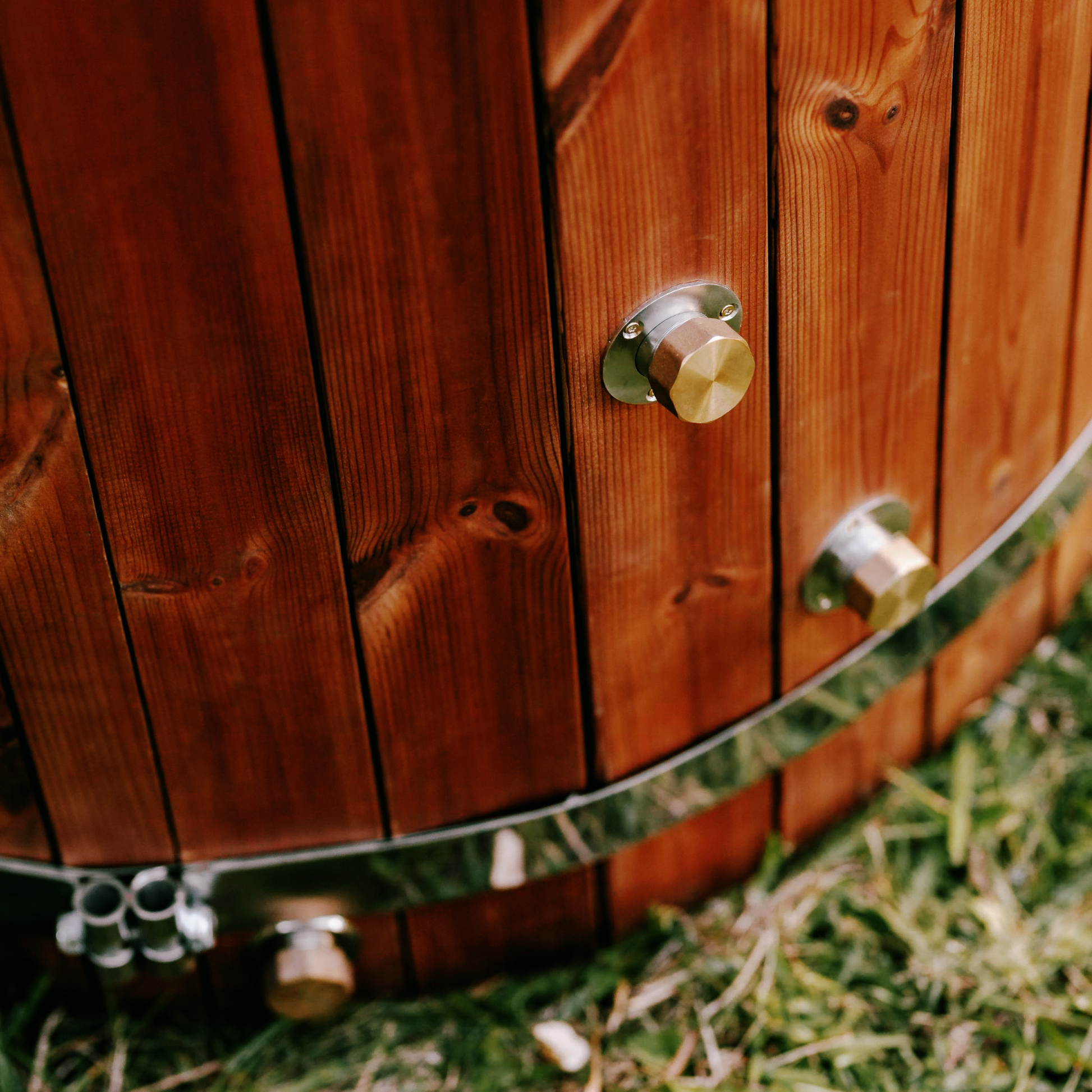 Wooden barrel with metal fixtures 