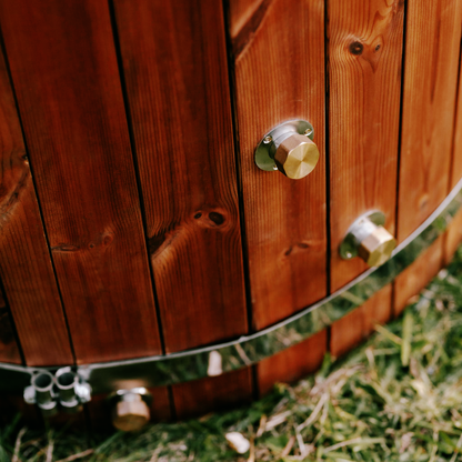 Wooden barrel with metal fixtures 